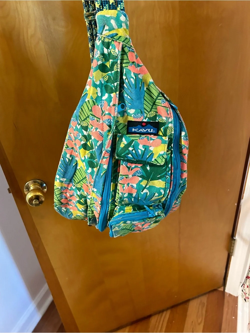 Kavu Floral Sling Bag in Teal, Coral and Yellow